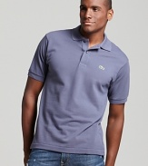 Lacoste's modern classic looks better than ever. The 2 button polo with the iconic alligator logo at the left chest.