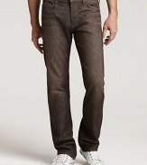 7 For All Mankind's Standard jean in a Buellton wash, featuring a straight leg, lower rise, and the signature squiggle stitching on the back pockets.