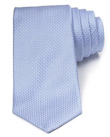 Patterned with bubble-like dots, this dapper tie invigorates your professional look with a dose of plush Italian silk.