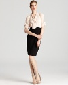 Anne Klein's smart and sophisticated twofer dress lends a polished finish with a pussybow neckline and pintucked details.