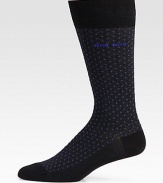 An allover dot pattern, shaped in a comfortable cotton blend with logo detail, is a perfect way to inject a dose of signature style into your dress wardrobe.Mid-calf height44% polyamide/28% modal/26% polyamide/2% elastaneMachine washImported