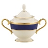 Inspired by privately commissioned presidential dinnerware, this fine china features stately navy bands and a gold border etched with patriotic stars.