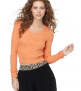 Cable knit gets modernized in a cool-girl cropped style with this Free People top -- a perfect spring staple!