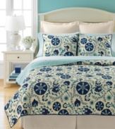 Underneath an array of comforting blue tones, this Suri Flowers king sham features an ultra-soft quilted damask pattern. A thin border of blue piping frames the design for a clean finish.