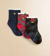 Festive plaid socks keep tiny feet comfy and cozy.Non-skid bottoms58% cotton/22% polyester/18% nylon/1% rubber/1% spandexMachine washImported