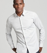 With subtle light gray stripes and a body-hugging slim fit, this button down sport shirt from Theory is a stylish must-have.