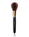 EXCLUSIVELY AT SAKS. An all purpose brush that glides soft and sensual against the skin for meticulous coverage. It provides a smooth even finish with a full dome shape assembled of sumptuous natural bristles, designed for applying pressed powder, loose powder and bronzing powder 