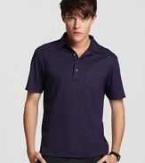 The classic fit polo from Michael Kors, accented with metallic buttons at the placket and left chest pocket.