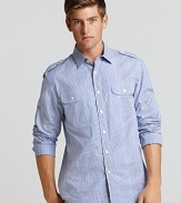 Tailored epaulets and button tab sleeves add structured style to this Michael Kors check shirt.