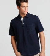 A deep navy polo from Michael Kors with a contrast three button placket--a comfy weekend essential.