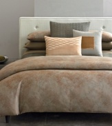 The velvet touch. A velvet block at center squares your bed away in modern Calvin Klein style.