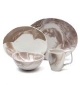 With soft, elegant curves in glazed porcelain, this Nambe dinnerware mimics the grace and beauty of a butterfly in flight. A marbled finish ensures no two pieces are the same, making each place setting an original work of art.