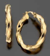 Fabulous textured twists make these 14k gold earrings a fashionable success. Approximate diameter: 1 inch.