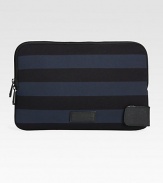 Striped neoprene zips around your laptop for a stylish, protective cover.Zip closureNeoprene13W x 8HImported