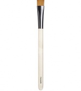 A small flat brush designed for precise application and blending of concealer. Made of synthetic materials. Made in USA.