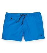 Bring a bright pop of color to your day in the sun with these classic MARC BY MARC JACOBS swim trunks.