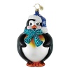 A charming puffin bundled up for frosty weather in a snowflake-print hat and scarf.