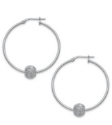 Added appeal. Giani Bernini takes its hoop earrings, set in sterling silver, to new heights of fashion with sparkle beads for a dazzling touch. Approximate diameter: 1-1/2 inches.