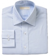 Versatile enough for year-round style and everyday cool, this comfortable cotton dress shirt from Michael Kors is a primetime player for workweek rotation.