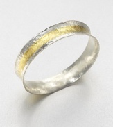 A concave design in sleek sterling silver and radiant 24k gold with a stunning hammered texture. Sterling silver24k goldSlip-on styleImported 