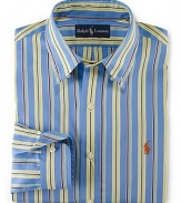 Tailored in a relaxed, classic fit from crisp cotton poplin, a long-sleeved sport shirt is given a handsome update with a vibrant, colorful striped pattern.