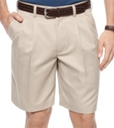 What a lightweight. Get classic style in a comfortable fit with these double-pleated shorts from Izod.