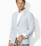 Light-as-air seersucker cotton lends preppy sensibility to a handsome sport coat, cut in a trim, modern silhouette for impeccable style.