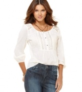 Rendered from lightweight cotton and featuring a vintage-inspired design, this DKNY jeans top is a romantic classic!