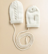 Luxury and warmth for those precious little hands, in pure, soft cashmere with rich cables.Cable detailRibbed trimThumbless designAttached loss-prevention stringCashmereDry cleanImported