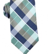 Get tied up in timeless style with this checkered Perry Ellis silk tie.