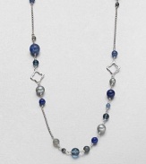 From the Bijoux Collection. A beautiful mix of semi-precious beads and sterling silver clover links on a long box link chain.Blue topaz, gray moonstone, gray cultured pearl, kyanite, lapis, labradorite, hematite and prasioliteSterling silverLength, about 40Toggle closureImported