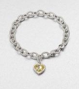 A sweet style with a textured sterling silver link chain and a canary crystal heart charm. Canary crystalSterling silverLength, about 7.5Lobster clasp closureImported 