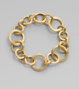 From the Jaipur Links Collection. A modern version of a classic link bracelet, formed of varied circular links of brushed 18k gold.18k yellow gold Length, about 8½ Hidden spring clip clasp Made in Italy