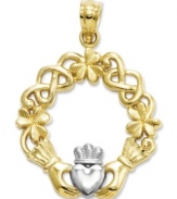 Symbolic for love, this pretty Claddagh charm makes the perfect gift. Crafted in 14k gold and sterling silver with a unique, cut-out shape. Chain not included. Approximate length: 1-1/10 inches. Approximate width: 4/5 inch.