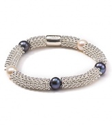 White and gray pearls are a cool contrast to sterling silver on this stretch bracelet from Links of London. Resist the urge to stack, this bangle makes a solo statement.