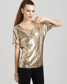 Whether on its own or under a fitted leather blazer, this MICHAEL Michael Kors sequin top injects your look with downtown dazzle.