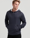 A retro favorite with contemporary details, Theory's weathered knit hoodie is an off-duty staple.