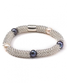 White and gray pearls are a cool contrast to sterling silver on this stretch bracelet from Links of London. Resist the urge to stack, this bangle makes a solo statement.