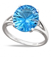 Polish your look in cool blue hues. This vibrant ring features an oval-cut blue topaz (5 ct. t.w.) and sparkling diamond side accents. Crafted in 14k white gold.