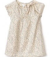 Cap sleeve dress with a vintage appeal, rendered in a soft beige base with muted floral prints. The crewneck and sleeves are gathered, while the hem is pleated and flowing.