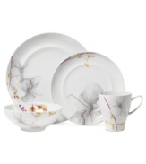 A natural at modern tables, the Aliza Gris place setting from Mikasa creates a serene landscape for casual dining. White porcelain with watercolor florals is sleek and elegant in form, but offers everyday durability.