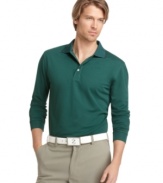 You'll play your best when you feel your best in this Izod golf shirt featuring moisture wicking and UV protection.