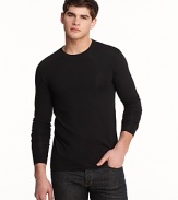 Long sleeve crewneck with wide cuff bands. Slimmer fitting with logo embroidered at bottom hem.