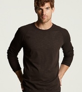 Long sleeve crewneck with knit ribbed shoulders and side detailing. Lightweight.