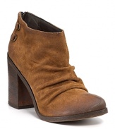 Soft, scrunched suede slouches atop a chunky heel for a chic, easygoing take on the classic cowboy boot. By Boutique 9.