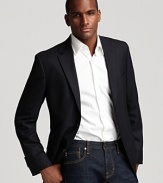 Dress it up or down. Two button sport coat with side vents. Slightly textured fabric, two front flap pockets.