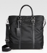 An everyday essential, handsomely crafted in tessuto nylon, trimmed with textured saffiano leather.Snap button closureDouble top handlesAdjustable shoulder strapInterior zip pocketNylon15W x 15H x 7DMade in Italy