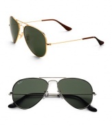 The classic aviator style, now available in super-lightweight, utterly stylish titanium. Available in arista frames with crystal green lenses and titanium-color frames with grey lenses. UV400 lens 100% UV protective Made in Italy 