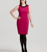 Showcase the glittering crystal embellished contrast neckline of this elegant Tahari Woman sheath dress by pairing the rose-hued silhouette with black stockings and glossy patent pumps.