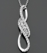 A romantic knot embellished with round-cut diamonds (1/2 ct. t.w.) signifies a beautiful bond. This Wrapped in Love(tm) diamond pendant is crafted in 14k white gold. Approximate length: 18 inches. Approximate drop: 1-1/4 inches.